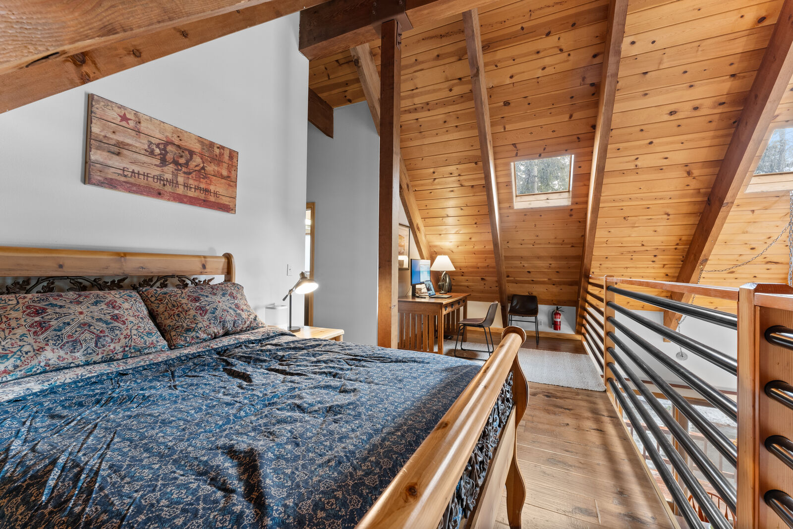 Bedroom with pitched ceiling