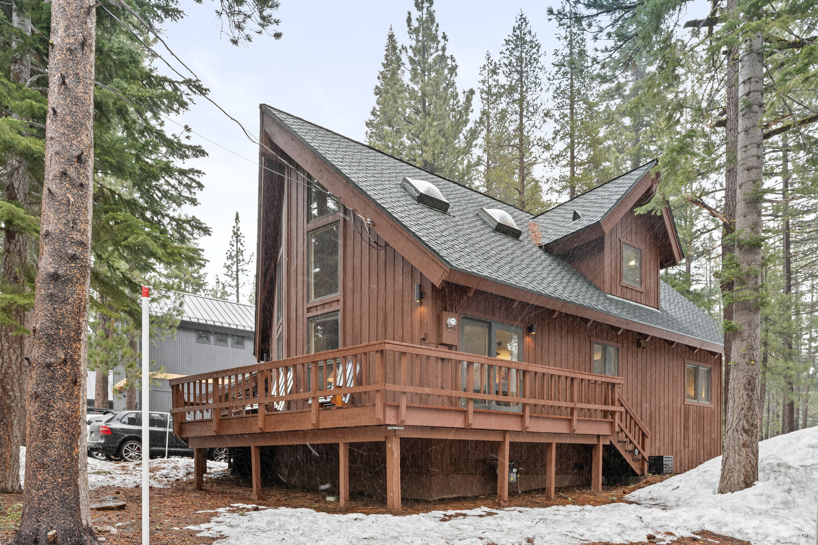 A-frame cabin with wraparound deck