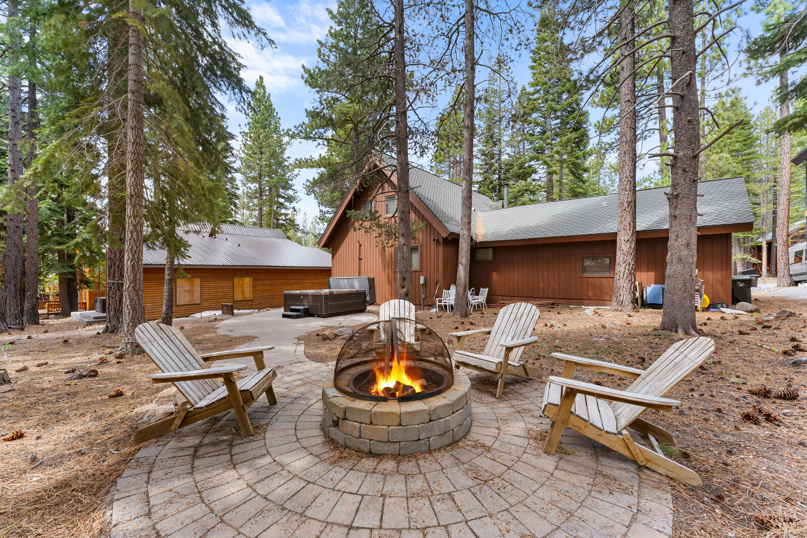 Fire pit with Adirondack chairs